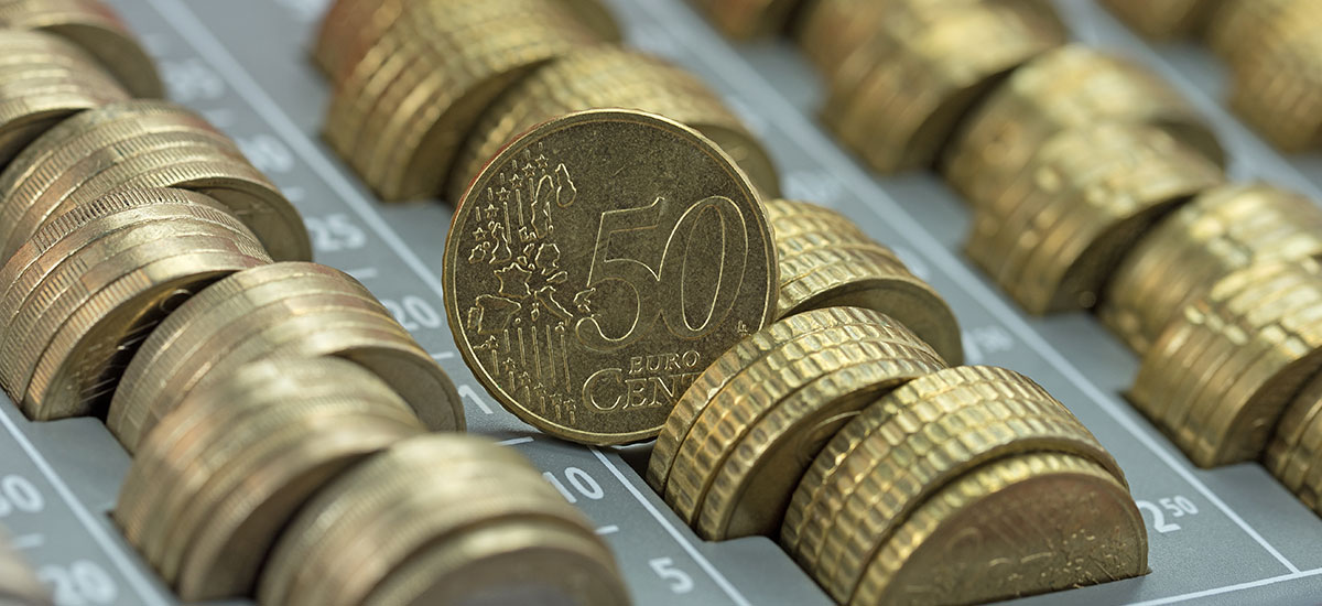 Symbolbild: Geld, Münzen, Zählbrett